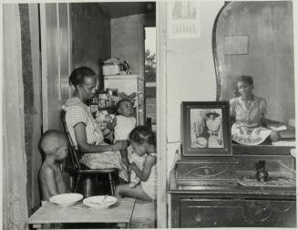 Washington, D.C. Mrs. Ella Watson, a government charwoman, with three grandchildren and her adopted daughter