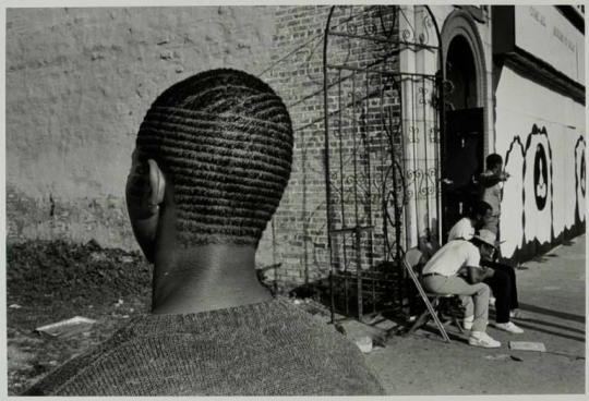 Channel Haircut in Front of the El Rukn Temple (now demolished), Chicago, Illinois