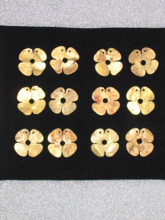 Twelve Ornaments in the Shape of Flowers