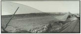 Fig. 2. Susan Meiselas, "6 P.M., U.S. Seen through Border Fence, Tijuana, Mexico," 1989