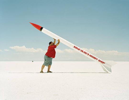 Man Lifting Rocket