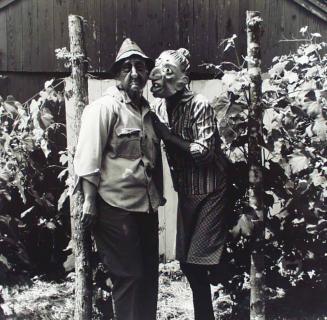 Lucybelle Crater and Close Friend in Grape Arbor