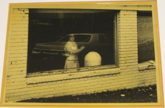 Untitled (worker in window with garbage can, DC)