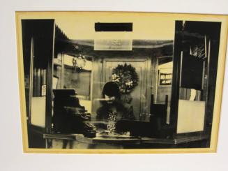 Untitled (woman in ticket booth with face obscured, NY)