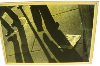 Untitled (legs, shadow, and newspaper, DC)