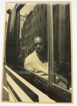 Untitled (man peering from bus, DC)