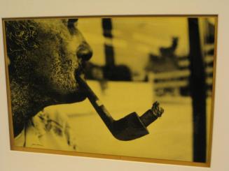 Untitled (man with cigar in pipe, DC)