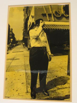 Untitled (man on corner, hand to head, zipper down, DC)