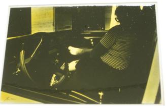 Untitled (woman in car with bandaged foot, DC)