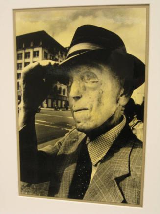 Untitled (man with hat and disfigured face, DC)
