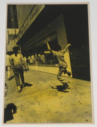 Untitled (boy hopping on sidewalk, IL)
