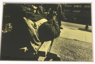 Untitled (man on bench, hand to head, D.C.)