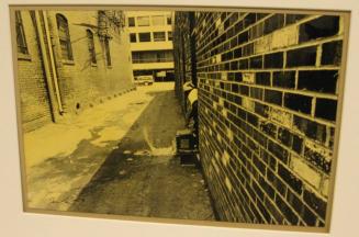 Untitled (man dumping water, DC)