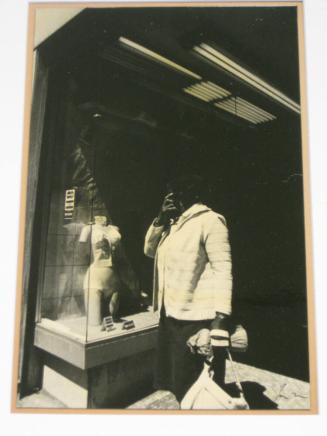 Untitled (large woman looking at bra and panty set, DC)