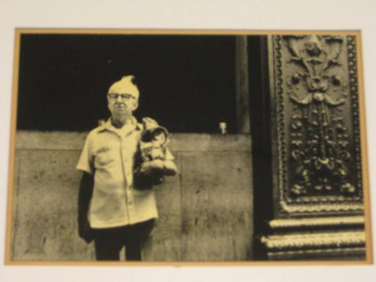 Untitled (man with white hair, holding bag, DC)