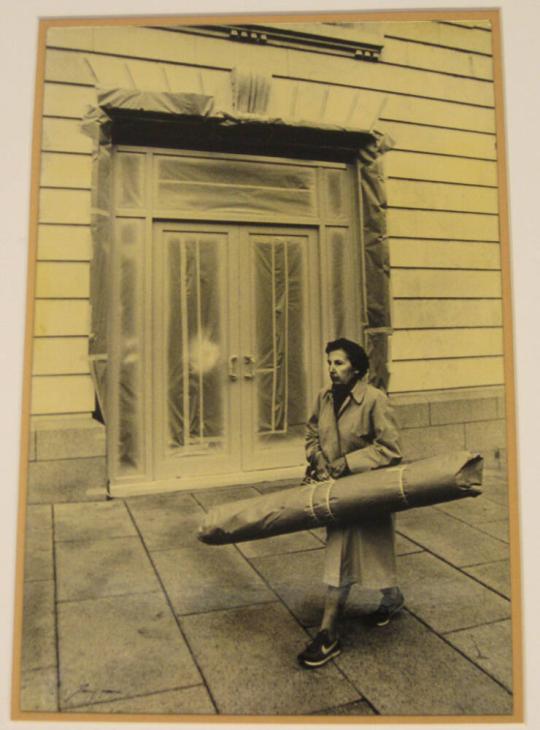 Untitled (woman with wrapped package in front of wrapped door, DC)