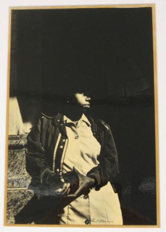 Untitled (woman in shadow holding black object, DC)