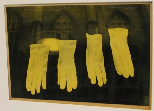 Untitled (four white gloves in window, DC)