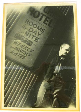 Untitled (man outside hotel, "rooms by day or night", DC)