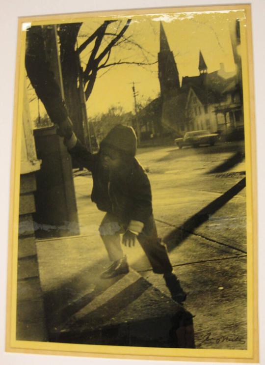 Untitled (little boy being helped up steps, DC)