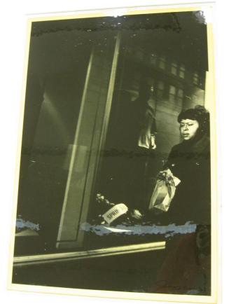 Untitled (woman in front of store window, "Spring", DC)