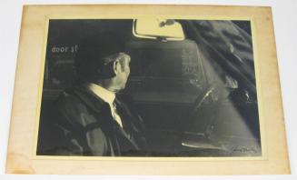 Untitled (driver looking at woman crossing road (dark), DC)