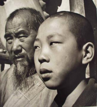 Chief Monk and Novice of a Buddhist Temple in China