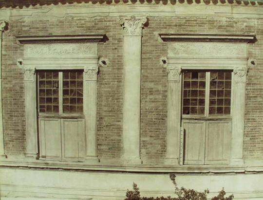 Windows in the courtyard of Palazzo Ducale in Gubbio.