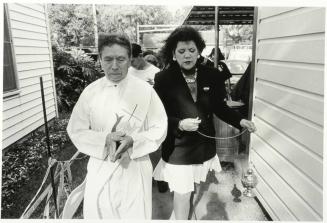 Rev. Deacon Jeronimo Bazon Blesses the Home