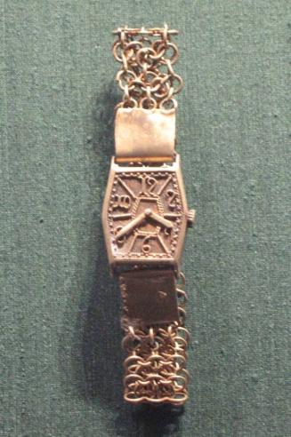 Chief's bracelet with watch-face ornament