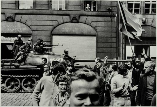 Tank in Side Square Facing Angry Crowd