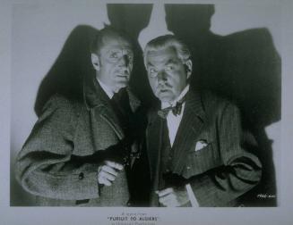 Basil Rathbone and Nigel Bruce in "Pursuit to Algiers"