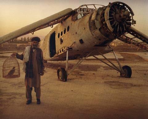 Old biplane on a display plinth at the Exhibition Grounds in Kabul. Fighting birds are a source of great pride to Afghan men, but were banned by the Taliban as un-Islamic