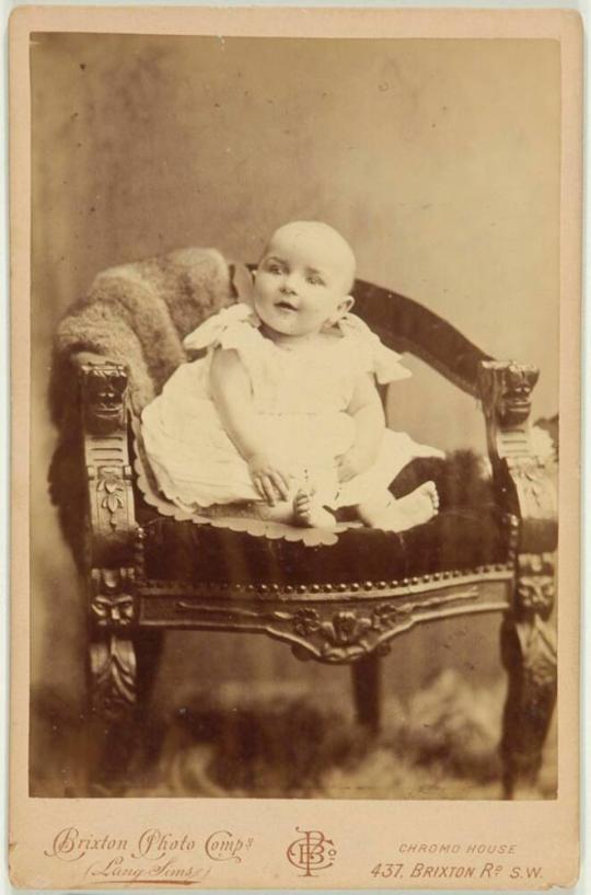 [Baby in Armchair]
