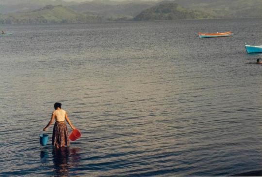 Woman Wading with Two Buckets