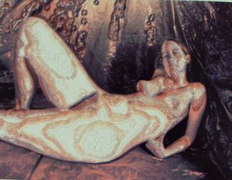[Reclining Nude (front) on sofa]