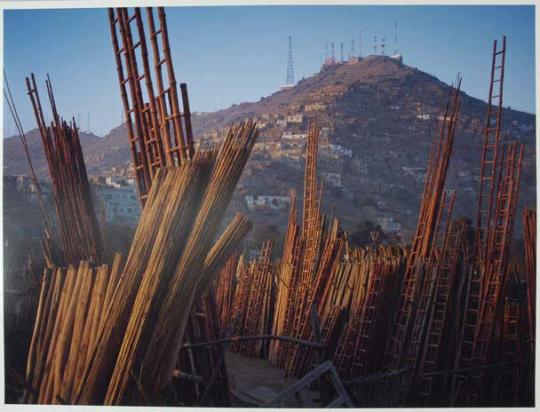 Yards supplying construction materials in Nawabadi Guzargah district of Kabul, overlooked by American-controlled electronic eavesdropping equipment on the summit of Kohe Asmai.