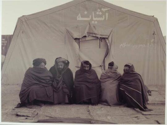 Strongly pro-Taliban refugees. For the photograph, they chose to partially cover their faces.