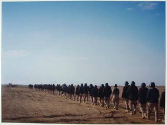 Afghan police trainees being taken to the firing ranges by US Marines, Camp Leatherneck, Helmand.