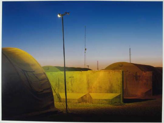 Security lights and communications antennae at Camp Leatherneck.