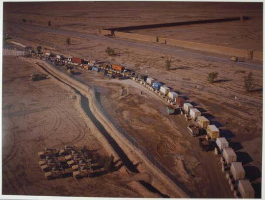 Pakistani ‘jingle trucks’ end their long journey up from Karachi at the gates of Kandahar Airfield where they wait to be scanned, X-rayed and searched. Only people, ammunition and emergency requirements come by aircraft. Warlord-owned security companies protecting convoys can charge $15,000 per truck, but a large part of the fee is paid to Taliban protection rackets.