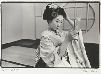 A Maiko Readies Herself Prior to a Dance Performance at the Kyoto Kokusai Hotel