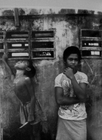 Two Boys, One Drinks, near Phnom Penh