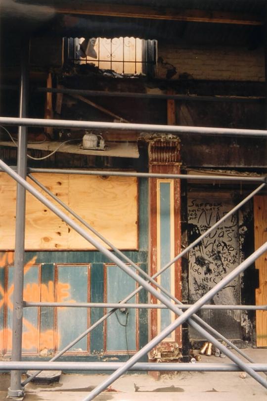 Boarded-up stores on Cedar Street