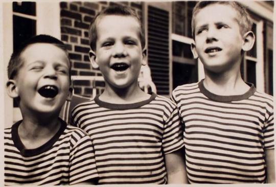 [three boys in striped shirts]