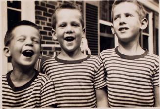 [three boys in striped shirts]