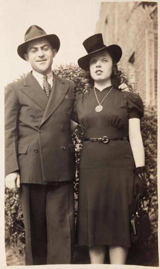 [man and woman in hats]