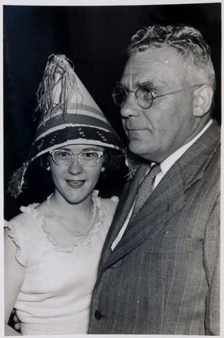 [woman wearing hat and glasses and and man in glasses "Nancy, Queen of Carnival / Peru / with Sr. Clausen. the Dane / from Argentina / Ejnes Clausen "