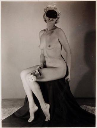 [nude woman in mask with flower sitting]