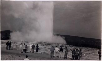 [people in front of geyser "Old Faithful, Yellowstone, Wyo."]